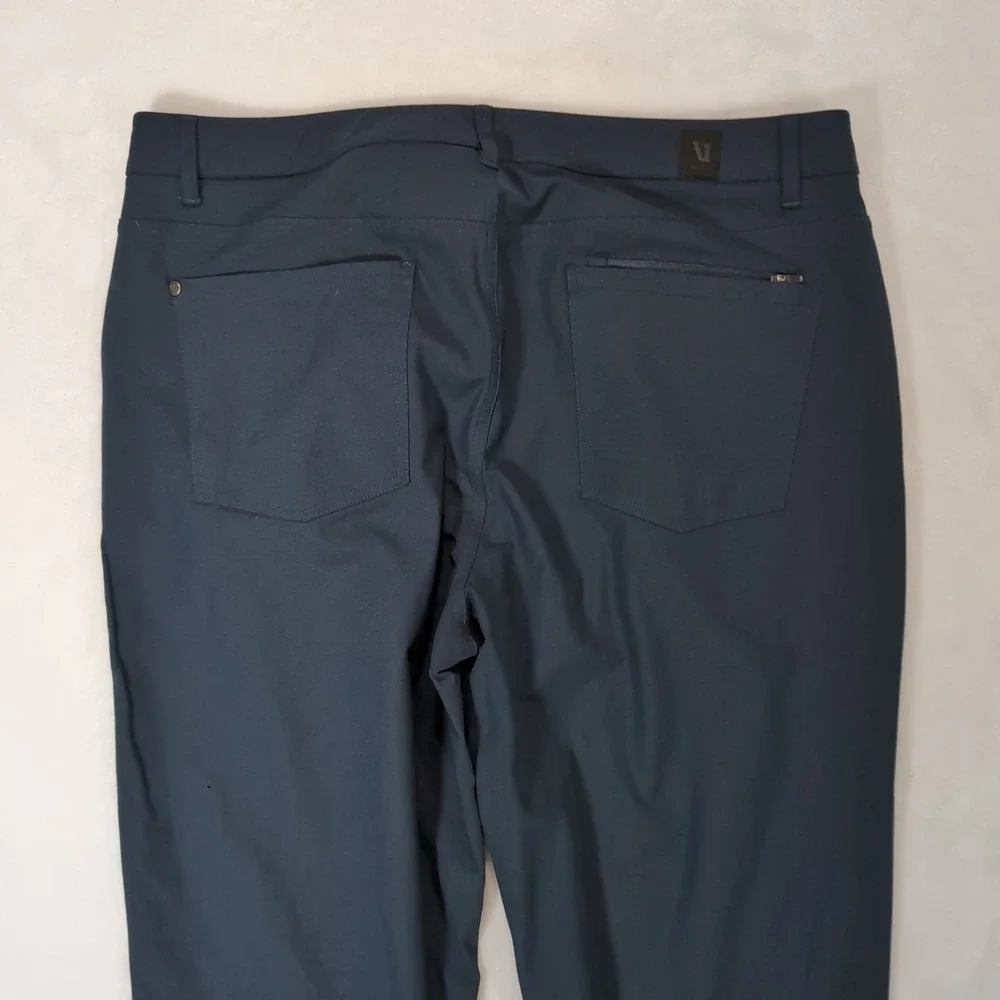 Vuori Meta Pant Men 36 Navy Blue Slim Taper 4-Way Stretch Tech V4009 Performance